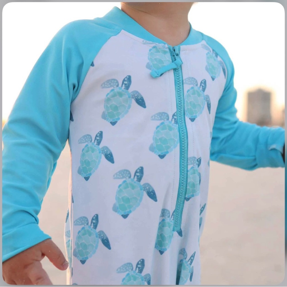 Caden Lane Infant swim suit , size 6-12 months , color blue .